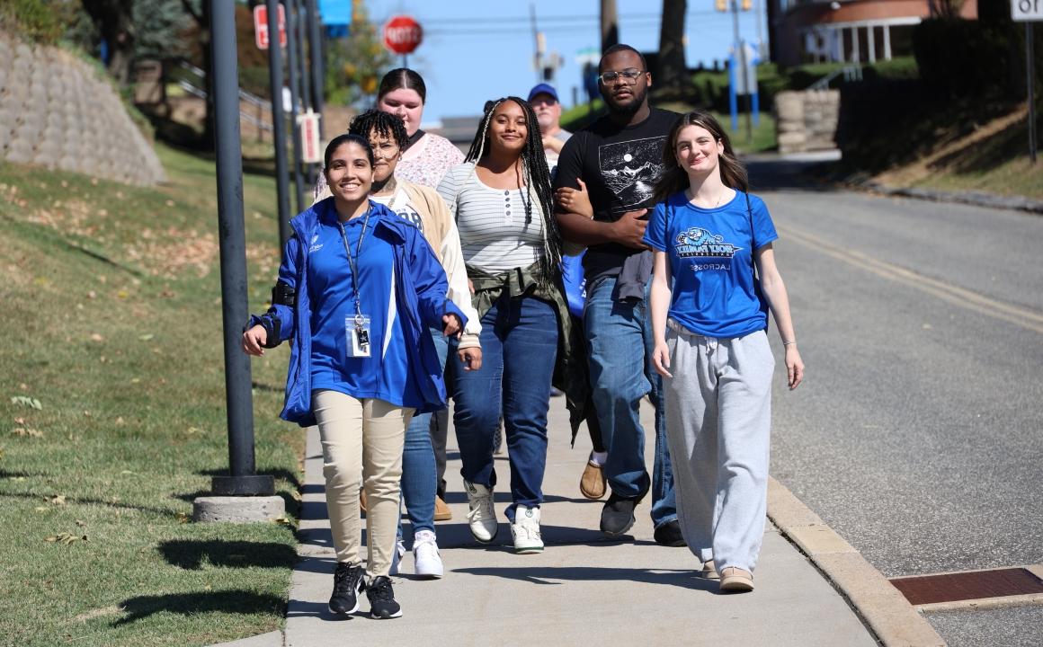 Holy Family students walking down Stevenson Lane.